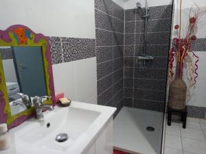 Koupelna v ubytování Mapi des Iles - chambre chez l'habitant