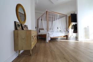 Postel nebo postele na pokoji v ubytování Domino Hotel