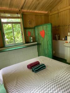 Postel nebo postele na pokoji v ubytování Cabañas Casa Soley + 14 fotografií