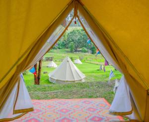 a view from the inside of a tent at Iluka Retreat Glamping Village in Red Hill South