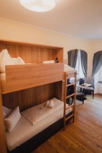 Postel nebo postele na pokoji v ubytování Hotel Restaurant DAS RÖSSL