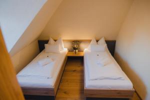 Postel nebo postele na pokoji v ubytování Hotel Restaurant DAS RÖSSL