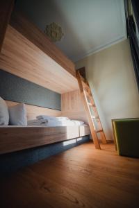 Postel nebo postele na pokoji v ubytování Hotel Restaurant DAS RÖSSL