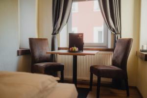 Posezení v ubytování Hotel Restaurant DAS RÖSSL
