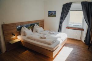 Postel nebo postele na pokoji v ubytování Hotel Restaurant DAS RÖSSL