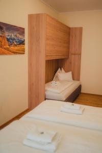 Postel nebo postele na pokoji v ubytování Hotel Restaurant DAS RÖSSL