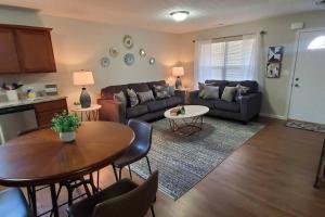 a living room with a couch and a table at Diamond of a Deal-708 in Middletown