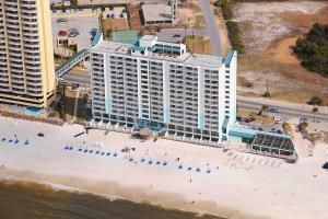 an aerial view of a hotel on the beach at Landmark Holiday Beach, a VRI resort in Panama City Beach