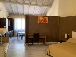 A bed or beds in a room at Il Ghetto Farm Holiday