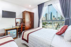 Voodi või voodid majutusasutuse Bao Ngoc Hotel & Apt toas