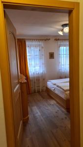 A bed or beds in a room at Appartamento Cesa Lamar