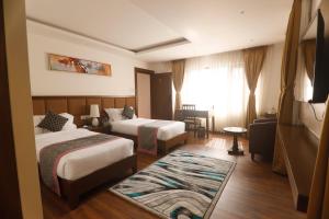 Postel nebo postele na pokoji v ubytování Meraki Holistic Wellness Retreat