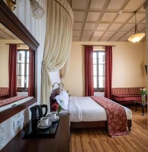 Postel nebo postele na pokoji v ubytování Halepa Hotel