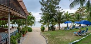 Photo de la galerie de l'établissement J Beach Suites At Rainbow Paradise, à Tanjung Bungah