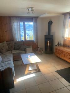 Posezení v ubytování Appartement dans chalet