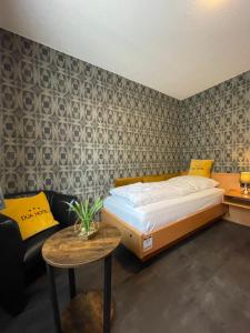 Postel nebo postele na pokoji v ubytování DUA Hotel