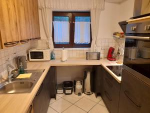 Kuchyň nebo kuchyňský kout v ubytování Souterrain Wohnung in Bensheim