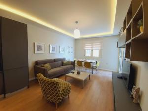 TV i/ili multimedijalni sistem u objektu Four Seasons Vlora