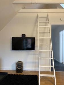 TV a/nebo společenská místnost v ubytování Ferienwohnung in Bad Bramstedt