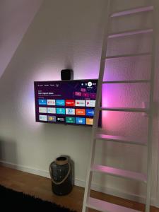 TV a/nebo společenská místnost v ubytování Ferienwohnung in Bad Bramstedt