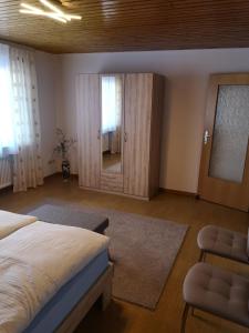 Postel nebo postele na pokoji v ubytování Ferien am Wald