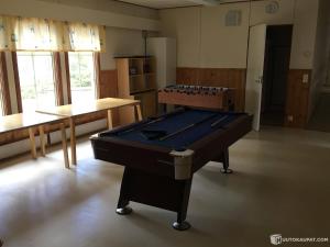 a large room with a pool table in it at NORDIC LAKES OY/AB in Taivalkoski