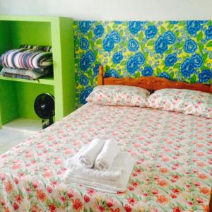 Cama ou camas em um quarto em Pousada do Sossego