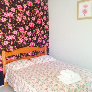 Cama ou camas em um quarto em Pousada do Sossego