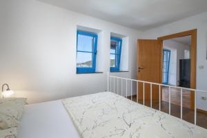 Posteľ alebo postele v izbe v ubytovaní Villa Lapida