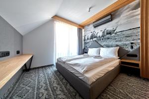 Postel nebo postele na pokoji v ubytování Tatra Square Apartments