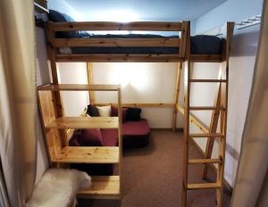 Krevet ili kreveti na sprat u jedinici u okviru objekta Grand studio 4 à 6 personnes, au pied des pistes