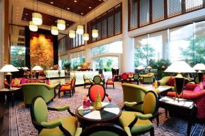 ห้องอาหารหรือที่รับประทานอาหารของ Century Park Hotel - SHA Extra Plus