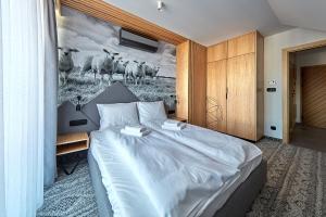 Postel nebo postele na pokoji v ubytování Tatra Square Apartments