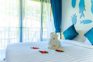 Postel nebo postele na pokoji v ubytování Golden Paradise Hotel - SHA PLUS