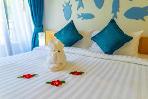 Postel nebo postele na pokoji v ubytování Golden Paradise Hotel - SHA PLUS