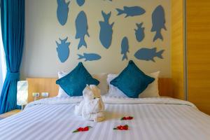 Postel nebo postele na pokoji v ubytování Golden Paradise Hotel - SHA PLUS