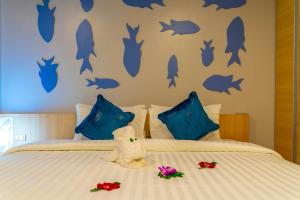 Postel nebo postele na pokoji v ubytování Golden Paradise Hotel - SHA PLUS