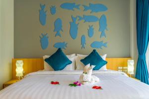 Postel nebo postele na pokoji v ubytování Golden Paradise Hotel - SHA PLUS