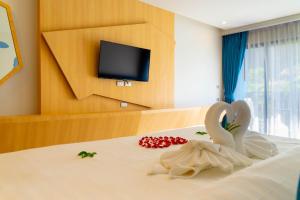 Postel nebo postele na pokoji v ubytování Golden Paradise Hotel - SHA PLUS