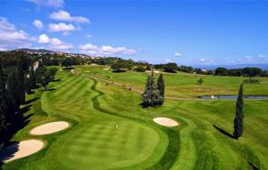 an overhead view of a green golf course at L'écrin du Cap Esterel in Saint-Raphaël