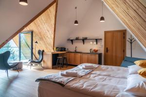 Postel nebo postele na pokoji v ubytování Shelter House Kościelisko