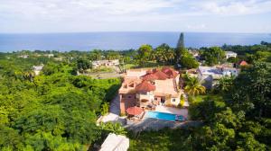 an aerial view of a house with the ocean in the background at Ocean View Terrace in Montego Bay