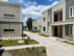 a rendering of a house with a driveway at La Escondida Salta 4 in Salta