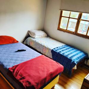 Postel nebo postele na pokoji v ubytování Alojamiento Raquel y Hector