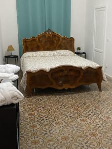 Ένα ή περισσότερα κρεβάτια σε δωμάτιο στο Patio1861 - A Sicilian deluxe apartment