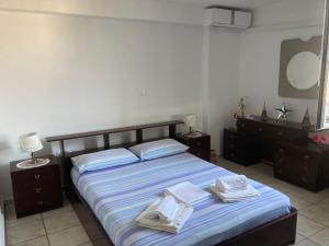 Postel nebo postele na pokoji v ubytování Seaview near Athens & Sounio