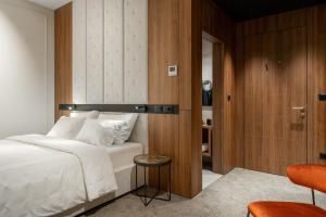 Postel nebo postele na pokoji v ubytování DeGrassi Boutique Garni Hotel Izola