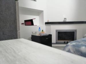 A bed or beds in a room at B&B I SIKULI