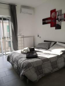 A bed or beds in a room at B&B I SIKULI