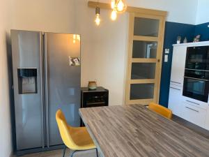 Kuchyň nebo kuchyňský kout v ubytování VILLA LOUNA 4 étoiles